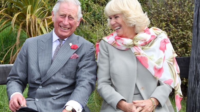 Charles III and Queen Camila laughing