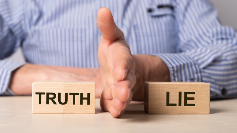 truth lie wooden blocks
