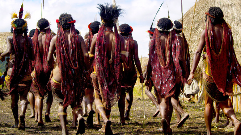 Dani people walking