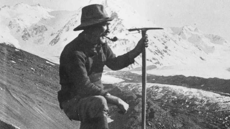 Mountaineer smokes a pipe