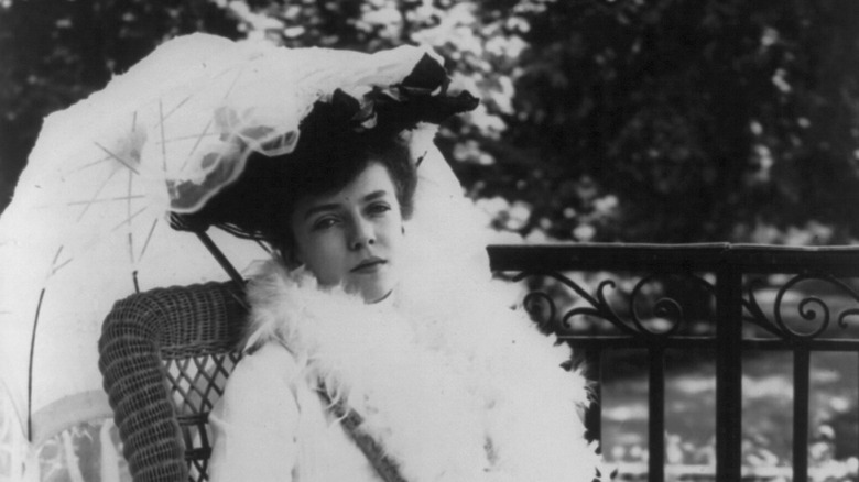 Alice Roosevelt holding umbrella