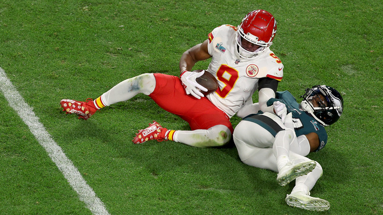 The Chiefs' JuJu Smith-Schuster and Eagles cornerback James Bradberry during Super Bowl LVII
