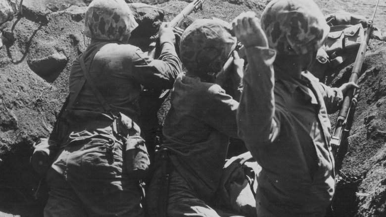 american troops in a foxhole on iwo jima world war ii