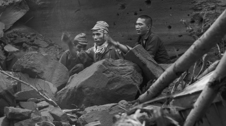 japanese soldiers leaving tunnels during battle of iwo jima