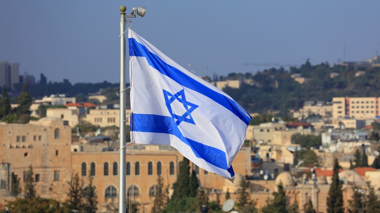 Israeli flag flying over Jerusalem