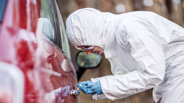 Crime scene investigation worker