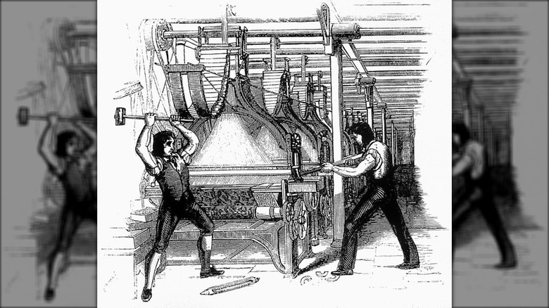 Luddites destroying machinery