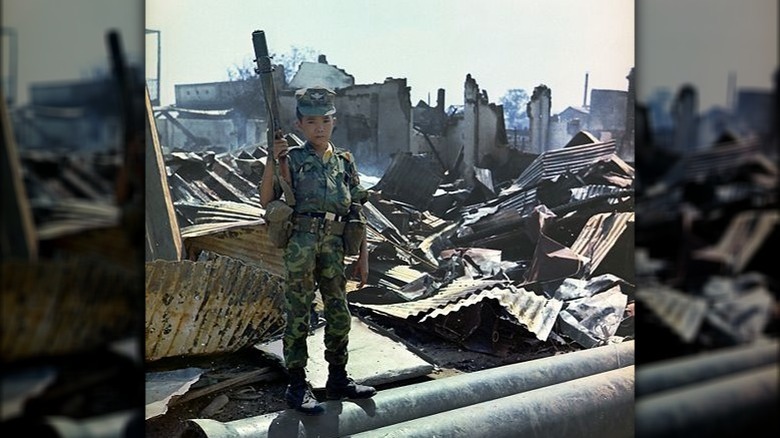 vietnamese child soldier with weapon