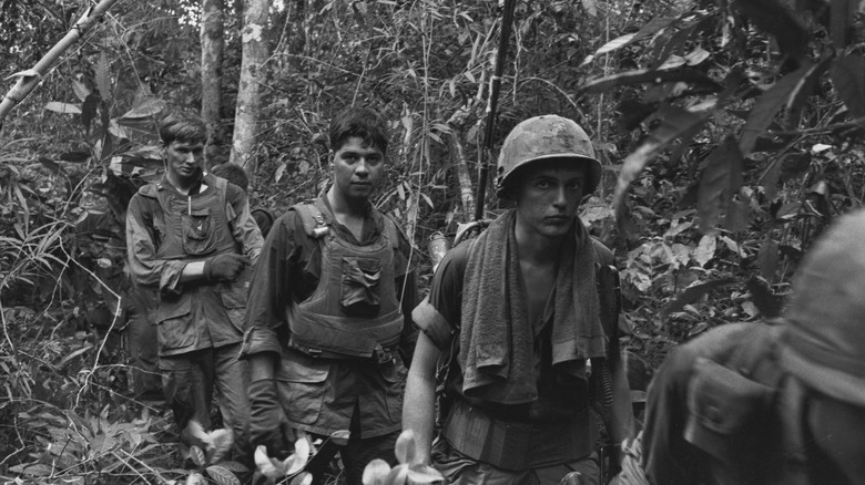 soldiers in vietnam forest