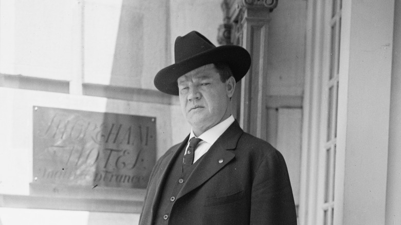 Bill Haywood outside a hotel