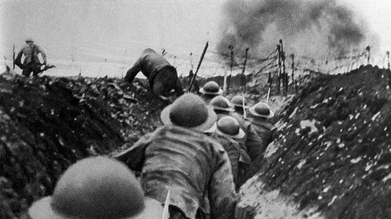 Soldiers exiting a trench during World War I