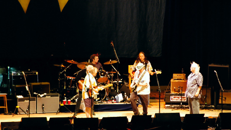 Crosby, Stills, Nash & Young performing on stage