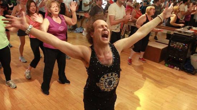 richard simmons teaching a class at slimmons