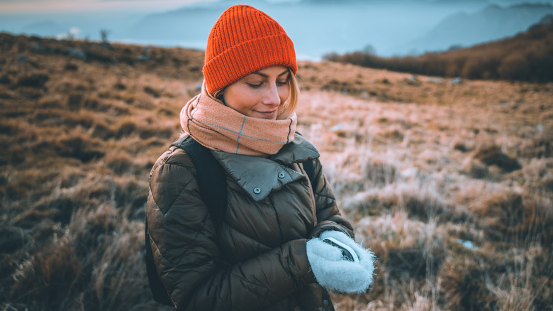 Holding electric hand warmer