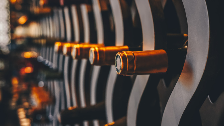 rows of bottles in wine racks