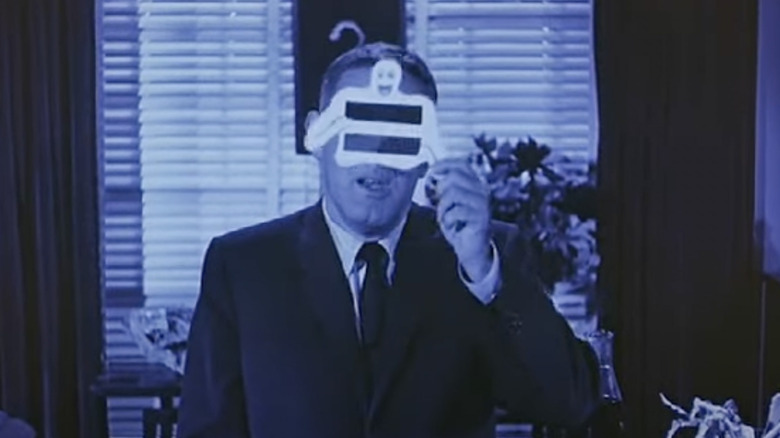 William Castle with Illusion-O viewer at the beginning of "13 Ghosts."