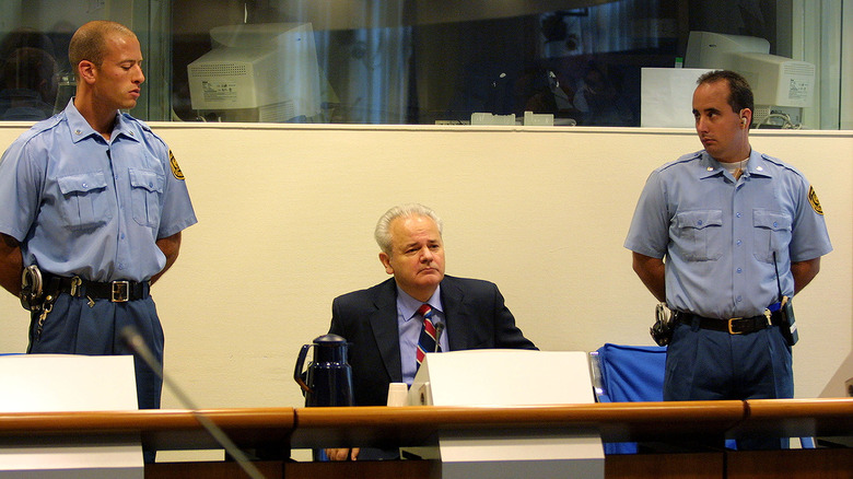 Slobodan Milosevic sitting in the ICC