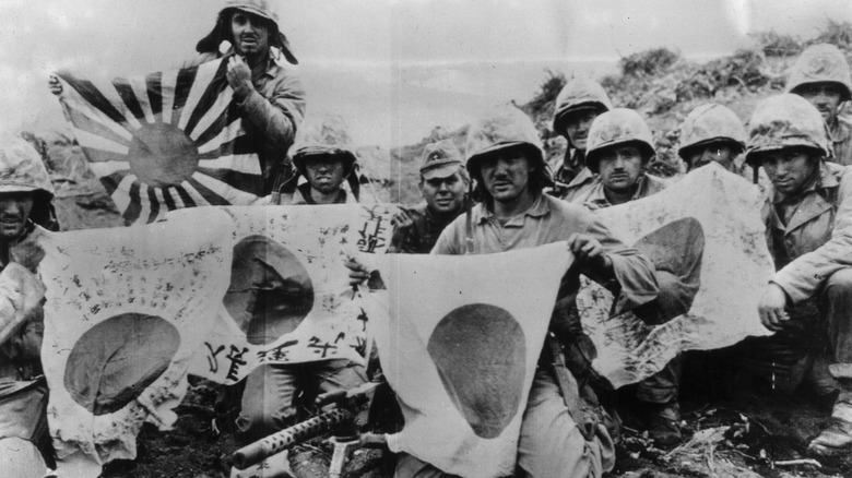 Capturing Japanese flags on Iwo Jima