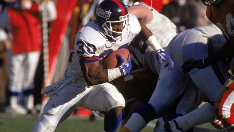 Dave Meggett running with football