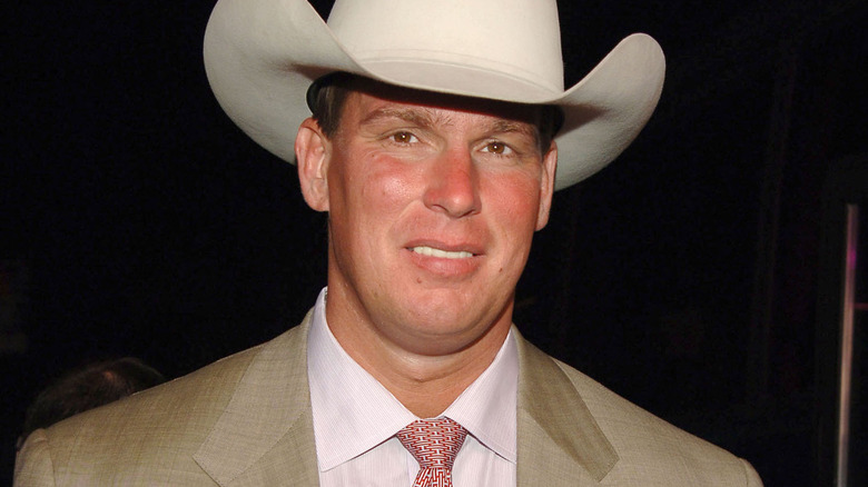 JBL smiling tan suit white hat