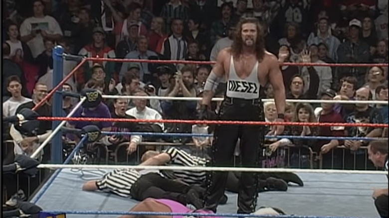 Kevin Nash celebrates after attacking Bret Hart