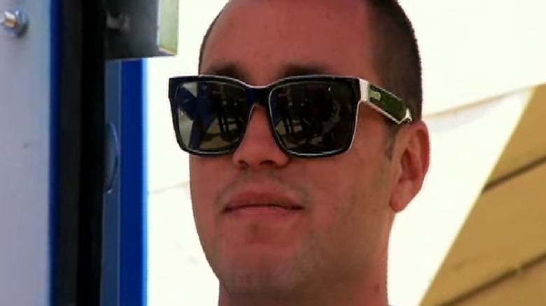 Jeremy Lusk wearing sunglasses