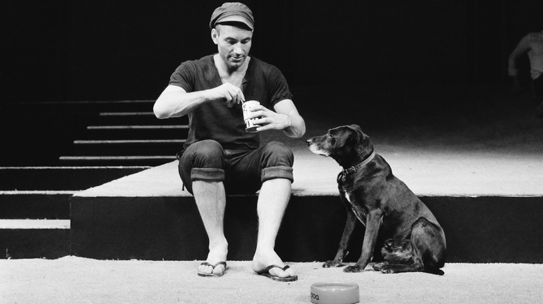 young Patrick Stewart on stage with a dog