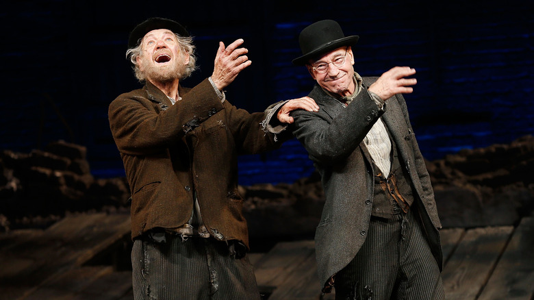 Patrick Stewart and Ian McKellan singing on stage