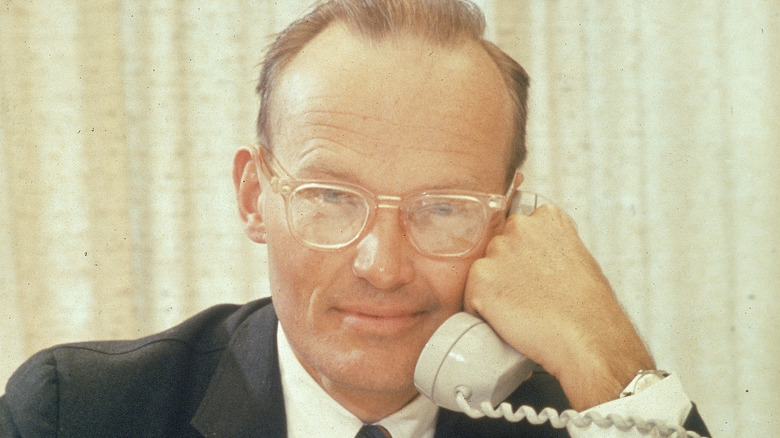 McGeorge Bundy holding telephone