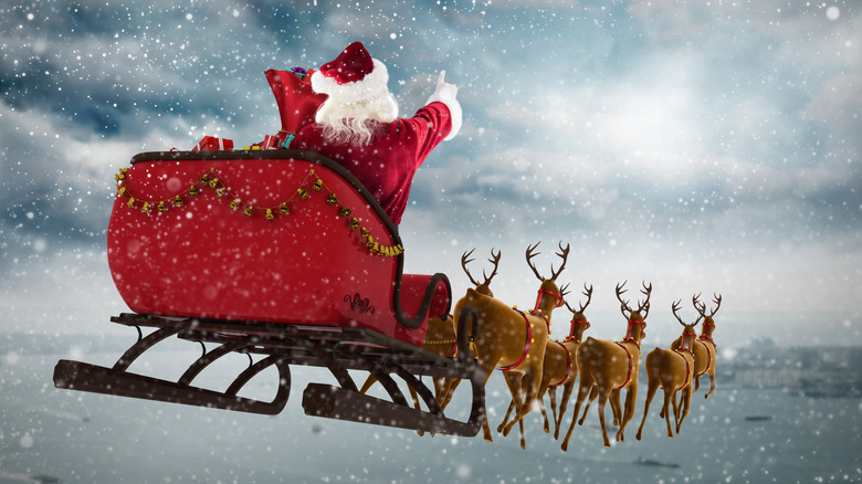 Santa's sleigh and flying reindeer 